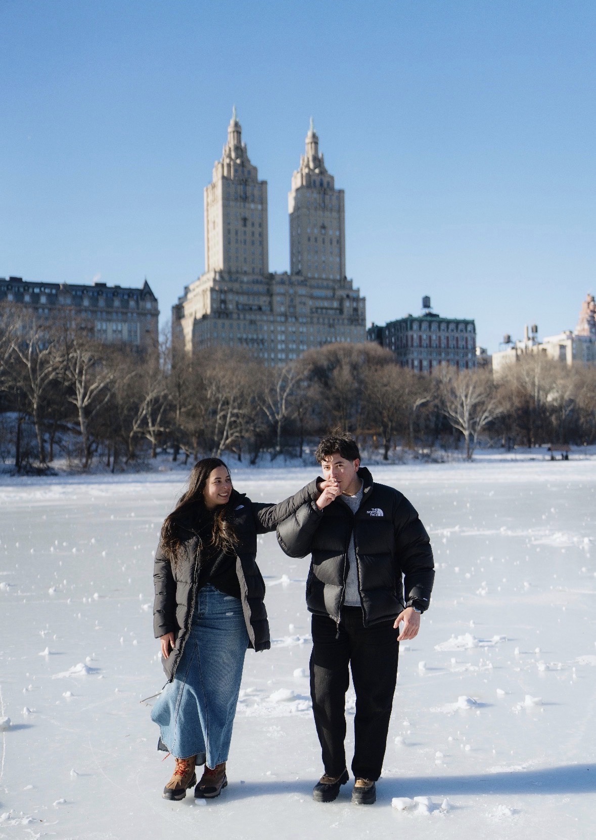 Newly engaged couple in Central Park in winter